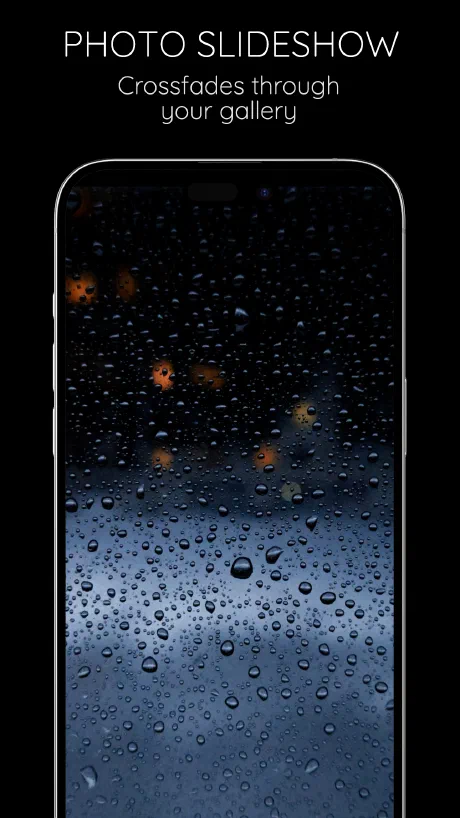 StandBy photo slideshow crossfading through gallery photos on a charging Android phone